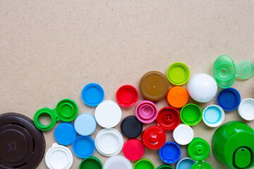 Colorful plastic bottle caps and plastic glass lid