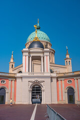 Saint Nicholas Church at Old Market square in the historical downtown with blue sky and sunny day, Potsdam, Germany.