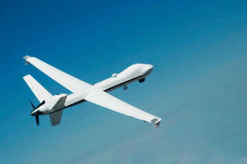Unmanned aerial vehicle against the sky. Elements of this image furnished by NASA
