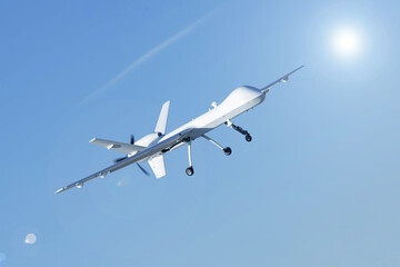 Unmanned aerial vehicle against the sky. Elements of this image furnished by NASA