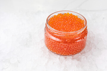 delicious red caviar in a glass jar

