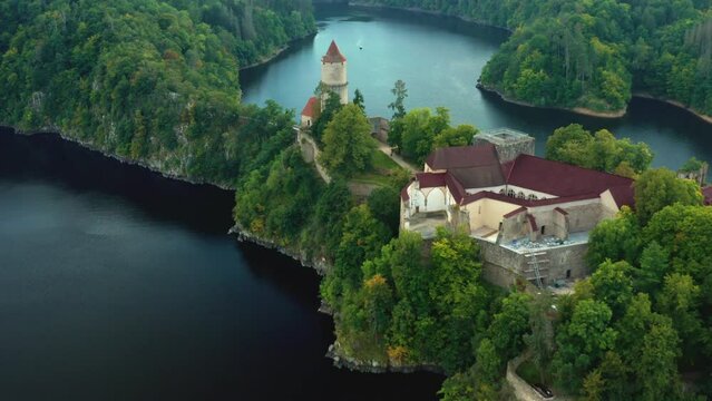 Zoom out of camera from Zvikov Castle on the hill surrounded by river Vltava and Otava in South Bohemia region in Czech Republic.