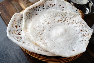 Kerala breakfast appam or palappam with mutton curry