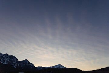 Sky Background of Cirrus Clouds Above Mountain Range