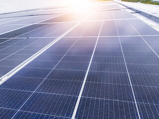 Photovoltaic solar panels mounted on building roof for producing clean ecological electricity at sunset. Production of renewable energy concept.