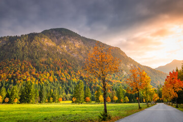 Road in Karwendel alps at autumn sunrise, tyrol and bavarian alps , Austria