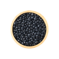 Black soy bean seeds in a wooden bowl, organic cereal food ingredient