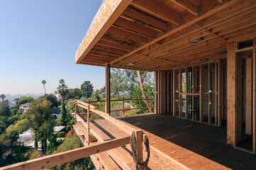 Modern wood and steel framed structure with wooden safety rails