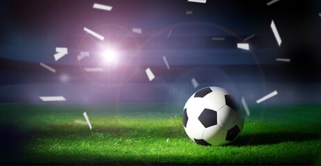 Fototapeta premium Soccer ball on the grass. Sport background.