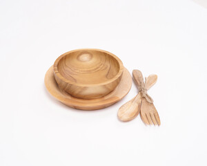 Fototapeta na wymiar bowl made of wood crafts. Aesthetic wooden bowls are perfect for serving with soup. remaining unused pieces of wood so that they become more useful items and have a high selling value.