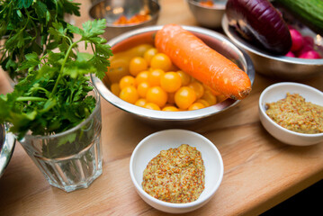 Ingredients for cooking dinner. Raw vegetables on a wooden table. Selective focus.