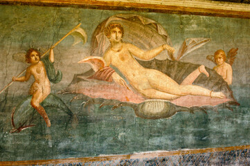Ancient Roman mural at the Roman city of Pompeii showing the Goddess Venus lying in a  shell with two nymphs.