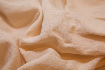 Pink fabric background. Pink cloth waves background texture. Pink fabric cloth textile material.