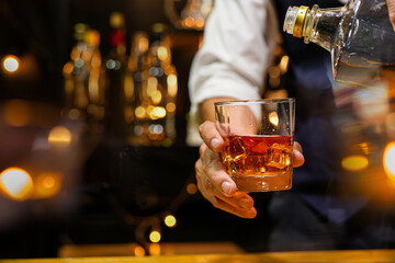 Bartender pouring Whiskey, on  bar,