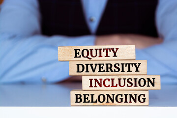 Wooden blocks with words 'Equity, diversity, inclusion and belonging'.