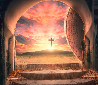 Easter concept: Empty tomb stone with three cross on meadow autumn sunrise background