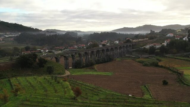 Train on Ancient Bridge Countryside Aerial HD