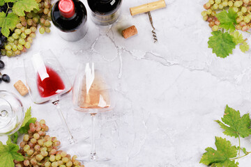 Fototapeta na wymiar White, rose and red wine bottles and glasses