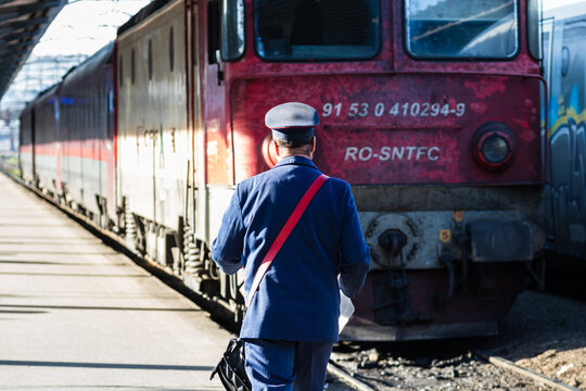Train crew doing checkings on the platform at Bucharest North Railway Station in Bucharest, Romania, 2023