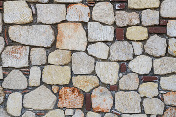 Background of brown-gray stone wall . Pattern of slate wall texture and background