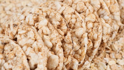 Oatmeal Cakes and raw oatmeal close up. Light diet snack