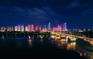 Aerial j bridge in changsha xiangjiang river city night scene