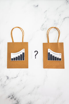 when will inflation go down. shopping bags with graph showing prices increasing then dropping with question mark, retail and groceries affecting cost of living