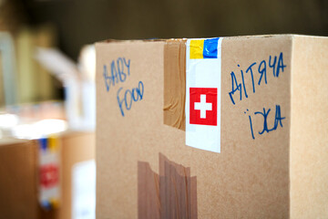 Boxes with humanitarian aid for Ukraine in volunteer centre warehouse
