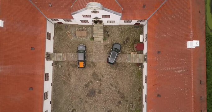 SUV Parked At Danish Manor House Building Surrounded By Moat - Aerial View