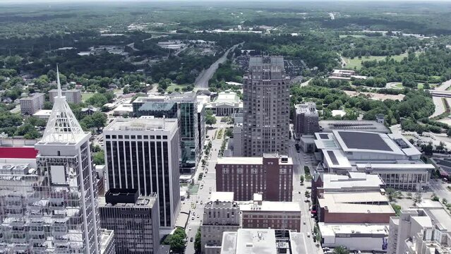 Aerial shot of downtown Raleigh skyscrapers. PNC Plaza building and other highrises in drone shot on summer day.