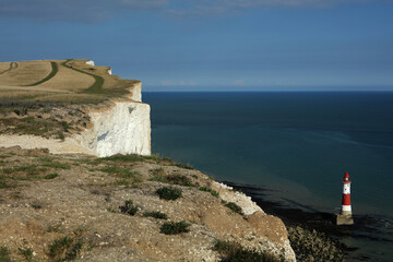 Fototapeta na wymiar Walking path in Seven Sisters area and Beachy Head Lighthouse, East Sussex, England, United Kingdom