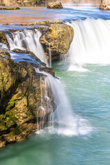 Obraz premium A small waterfall on a mountain river. Manavgat waterfall in Turkey.