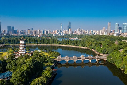 Aerial leap changsha martyrs park lake xiaoxiang pavilion with wind and rain bridge