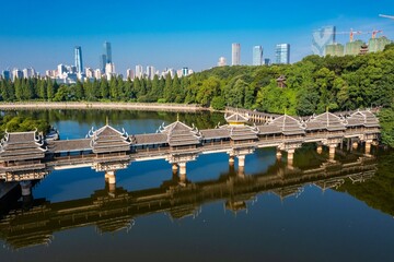 Aerial leap changsha martyrs park lake wind and rain bridge and the urban landscape