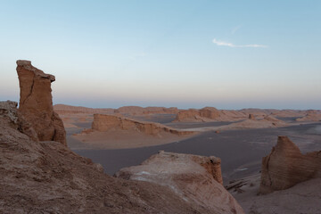Peaceful view of the beautiful Dasht-e Lut Desert and its rock formations (Kaluts) at sunset, Kerman Province, Iran