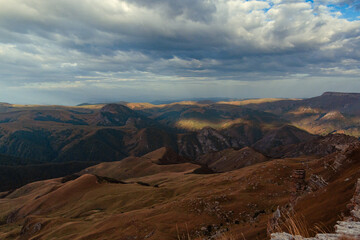Dawn in the mountains. A game of shadows. Mountain landscape. 