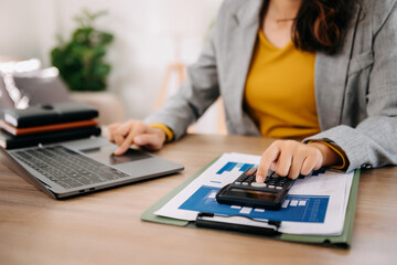 Business accountant or financial expert analyze business report graph and finance chart. banking business and stock market research. At office