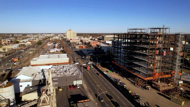 aerial push in to new contruction in modesto california