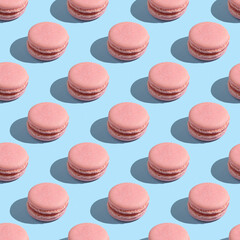 Seamless pattern with punk macaron on blue background.
