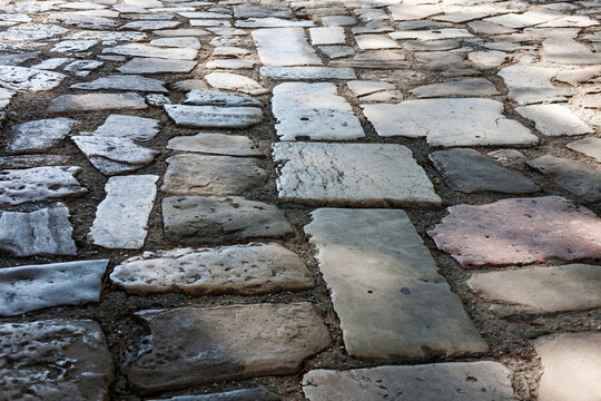 Cobblestone covered with old paving stones, Lisbon, Portugal