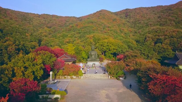 Aerial video of Gakwonsa temple during Autumn season in Cheonan city, South Korea. Aerial shot from drone.