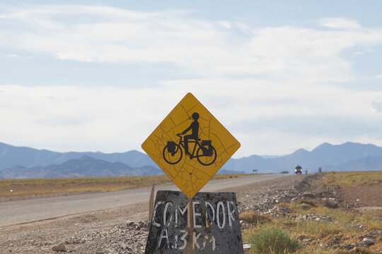 Close-up of warning bicycles crossing road sign