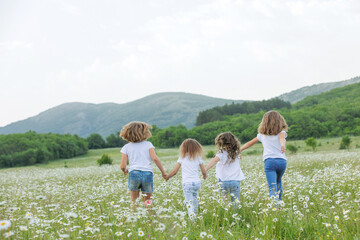 Fototapeta premium Children have fun playing in nature. 