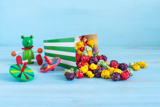 Food background with rainbow popcorn for kid's snack.