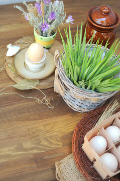 Farmer's hen eggs, fresh grass and flowers, organic food concept