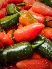 Red & Green Chilli Peppers With Raindrops
