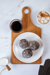 homemade round chocolate candy with coconut sprinkles