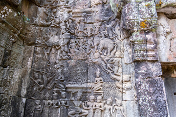 The stone carvings at Ta Prohm Temple. Is an abandoned Buddhist temple in a jungle. Angkor Wat. Cambodia
