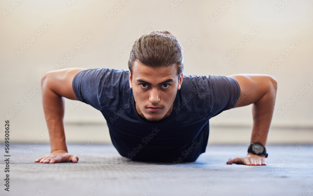 Poster Fitness, portrait or push up with man in gym training or exercising in a body workout for endurance. Healthy male, strong or powerful sports athlete focused on floor exercise challenge for wellness