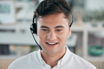 Call center, man and customer service consultant with a smile and headphones for contact us or crm....